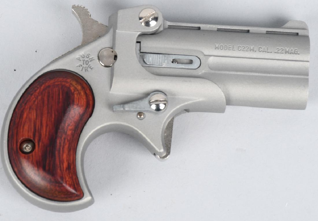 COBRA C22M 22 MAGNUM DERRINGER: SN 079078. 2.4" Over / Under single action derringer pistol in .22 Magnum. Cobra Enterprises of Utah, Inc. Model C22M. Featuring fixed sights, rosewood grips. Appears unfired, bore and finish near min