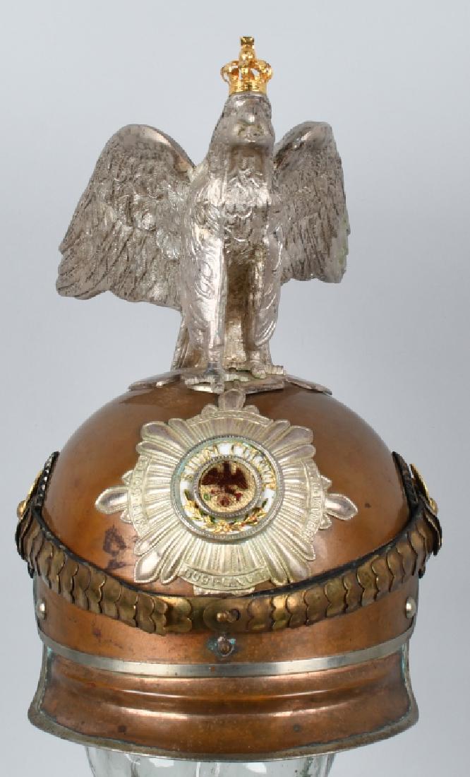 IMPERIAL GERMAN GARDE DE CORPS HELMET: Museum Quality Reproduction - excellent. Has some age on the lobster tail portion on the reverse; eagle and crown are newer production. Excellent