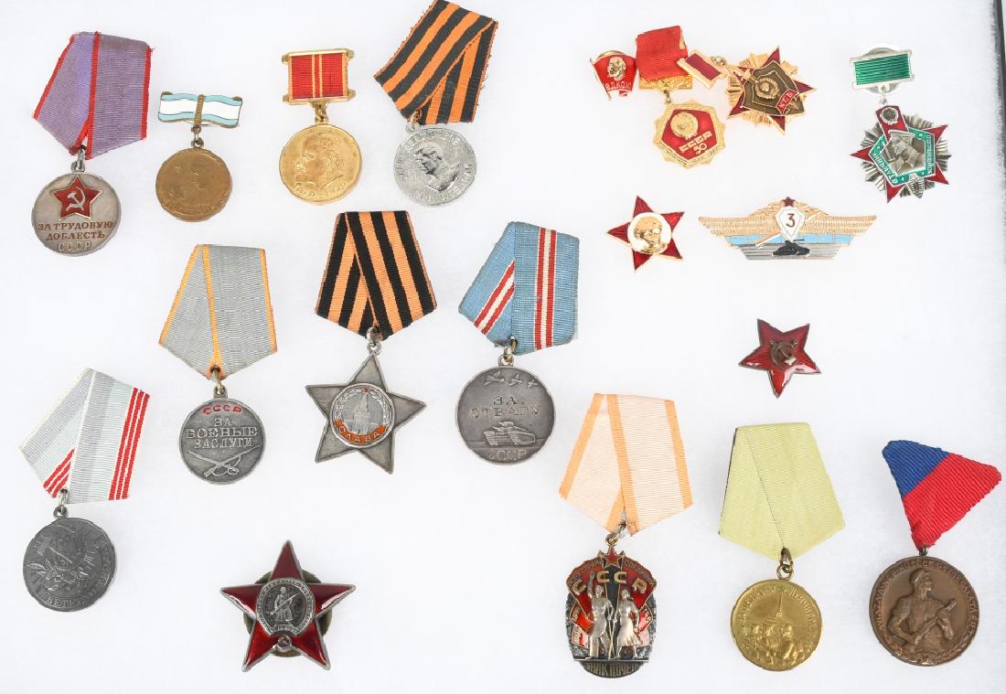 COLLECTION OF SOVIET RUSSIAN MILITARY MEDALS: 18 Soviet Union Military, Civilian, and Communist Party medals. Including the Veteran of Labor Medal (est. 1974), the Maternity Medal (for having 5 children survive to maturity), WWII Victory commemor