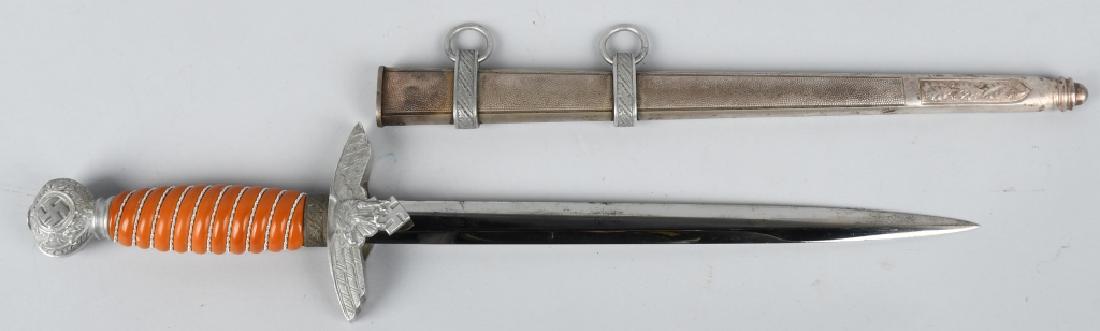 WWII NAZI GERMAN LUFTWAFFE OFFICERS DAGGER BY SMF: Roughly 29cm long bright nickel/silver plated double edged drop forged steel stiletto style blade with a flat central plane. Maker marked to "SMF" also having an issue Waffenamt. The leather washer is