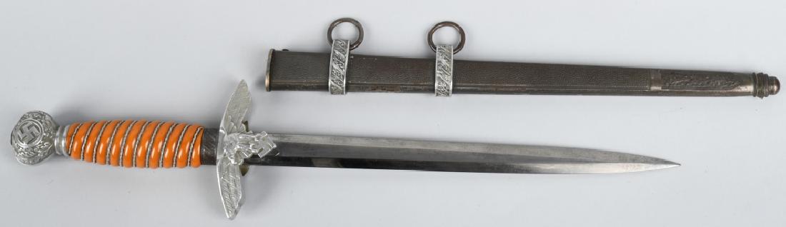 WWII NAZI GERMAN LUFTWAFFE OFFICERS DAGGER by SMF: Roughly 29cm long bright nickel/silver plated double edged drop forged steel stiletto style blade with a flat central plane. Maker marked to "SMF" also having an issue Waffenamt. The leather washer is