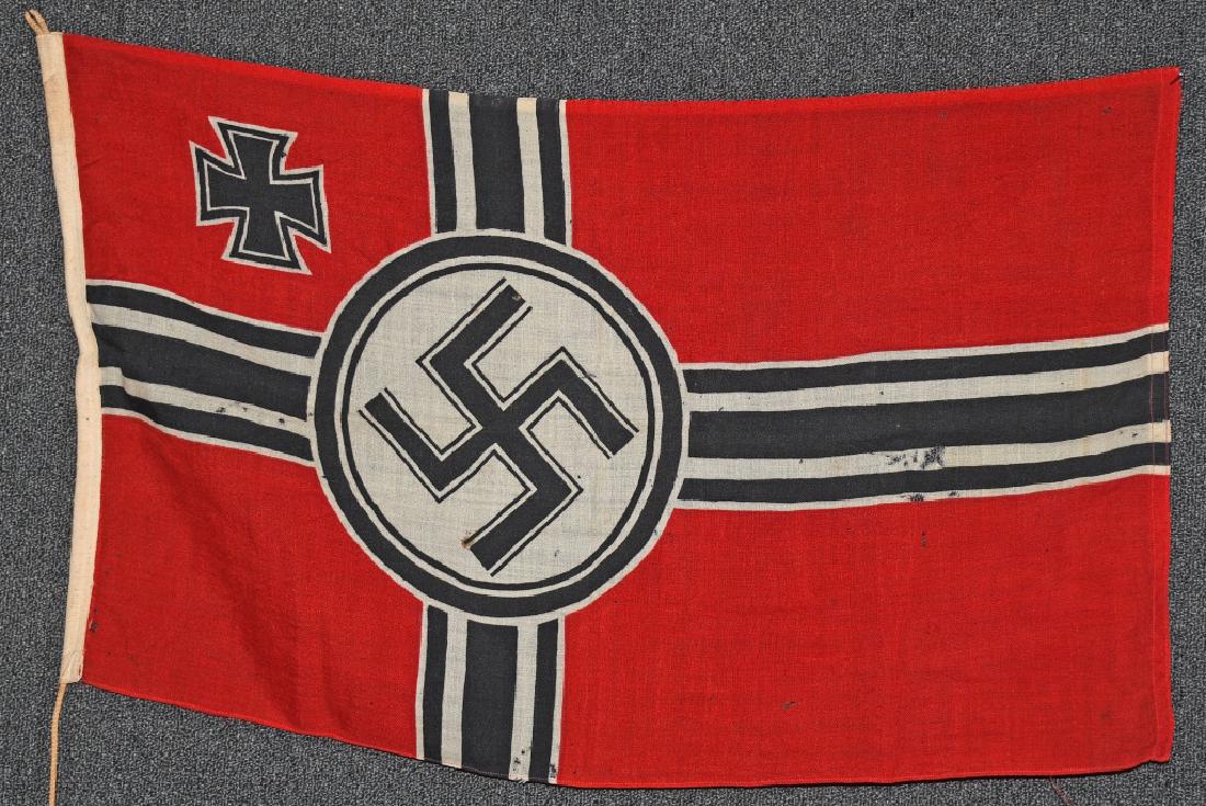 WWII NAZI GERMAN KREIGSMARINE BATTLESHIP FLAG: Second pattern, (Circa 1937/38-1945), single piece, dual sided, printed wool construction national war flag. The flag features a red base field with a central white/black/white/black bordered white di