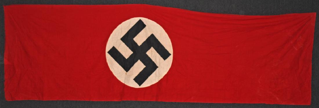 WWII NAZI GERMAN NSDAP WALL BANNER & BOOK: Massive multi-piece double sided cotton construction banner approximately 12 feet 6 inches X 47 inches. To both its red fields are sewn white disks, with a printed mobile swastikas in black. Secondly 