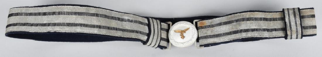 WWII NAZI GERMAN LUFTWAFFE BROCADE OFFICERS BELT: This is a very good example of a desirable set. There is some slight wear and discoloration to the brocade. The aluminum buckle is in very good condition. It has a silver finish that remains mostly in
