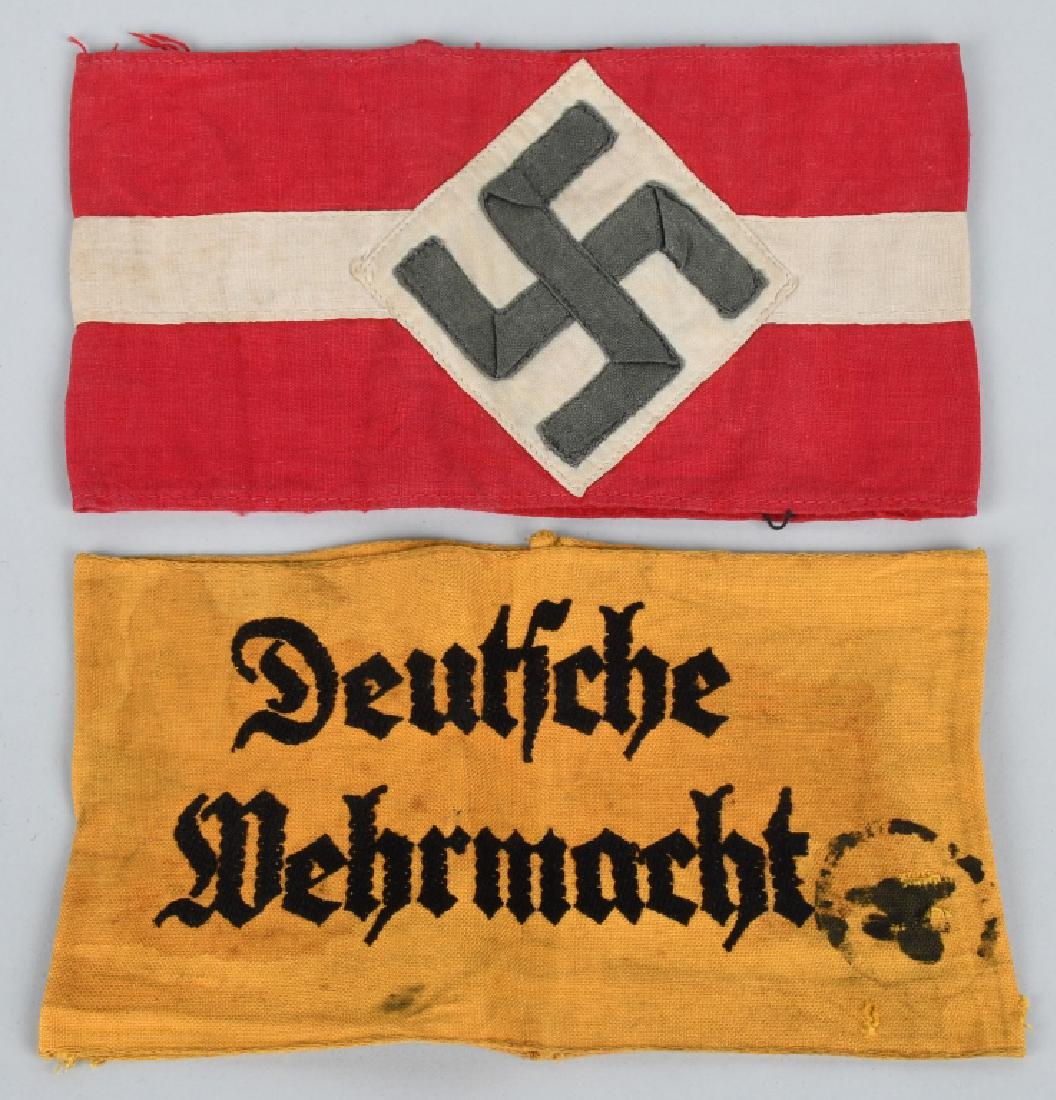 WWII NAZI GERMAN ARMBAND LOT OF 2 HJ AND WEHRMACHT: Lot of two Nazi German armbands. Lot consist of a Deutsche Wehrmacht armband that is roughly, 10.5cm tall 36cm long woven yellow cotton construction armband with embroidered black Gothic script in two