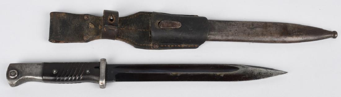 WWII NAZI GERMAN K98 BAYONET AND SCABBARD HORSTER: Approximately 10" blade, 15.5" overall length. WWII K98 Bayonet made by E. Horster and so marked on the blade. Serial number 3055 on the bayonet and sheath match. Also has leather frog. Blued steel bl