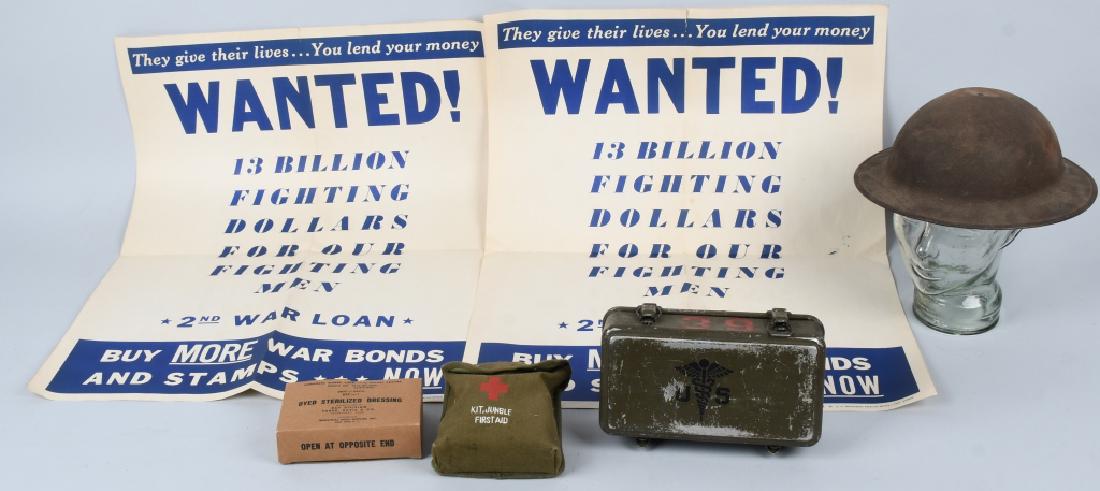 WWI HELMET WWII POSTERS FIRST AID GEAR LOT: Lot includes WWI US Doughboy Helmet, missing liner and chinstrap, field dressing, WWII Marine Corps Jungle First Aid Kit, First Aid kit in canister (as mounted in Jeeps and tracked vehicles, etc.) and