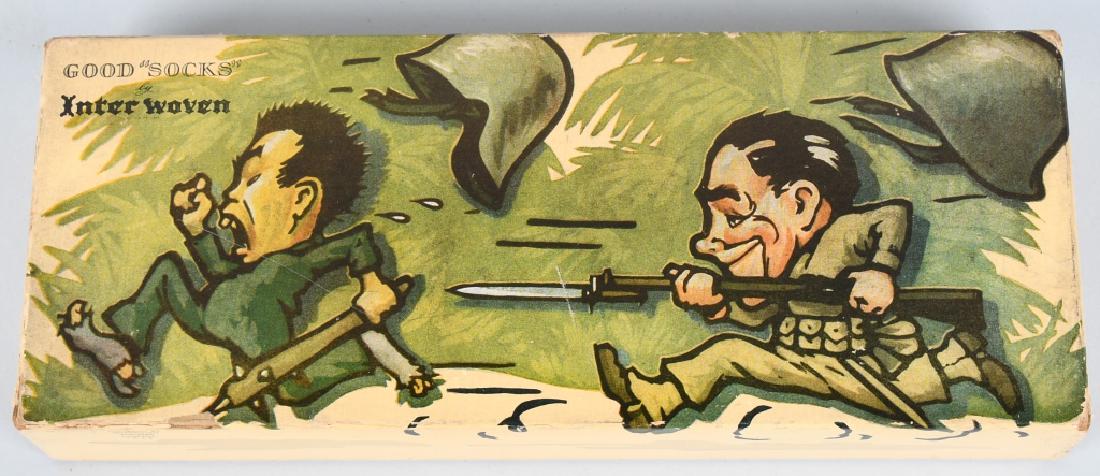 1942 DATED ANTI-JAPANESE ADVERISING INTERWOVEN BOX: Interwoven brand paper-over-cardboard box with depiction of American GI chasing a Japanese soldier with a fixed bayonet. The Japanese soldier is depicted as buck-toothed, shoeless in tattered socks, a