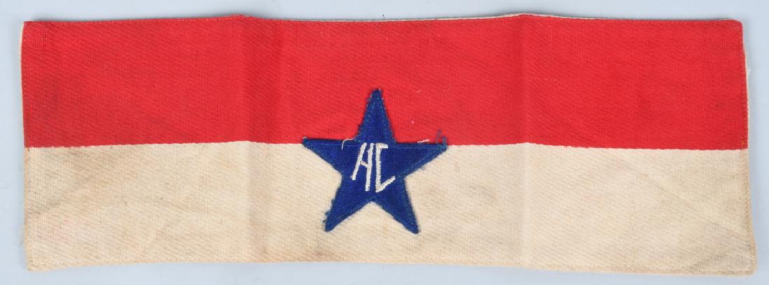 WWII US HOLLYWOOD CANTEEN HOSTESS ARMBAND: This is an original armband which belonged to a hostess at the famous Hollywood Canteen a Miss. Connie Roberts. Connie Roberts worked under the direction of Bette Davis and nearly every major film, mu