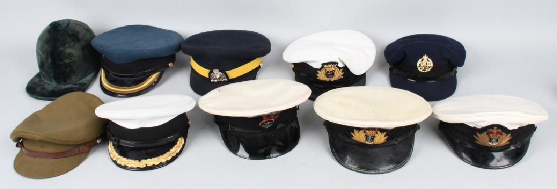 BRITISH ROYAL ARMY and NAVY CAPS LOT: 10 visor caps, all appear to be post World War II - British, Canadian, Royal Navy, Royal Air Force, and more. Good - Excellent