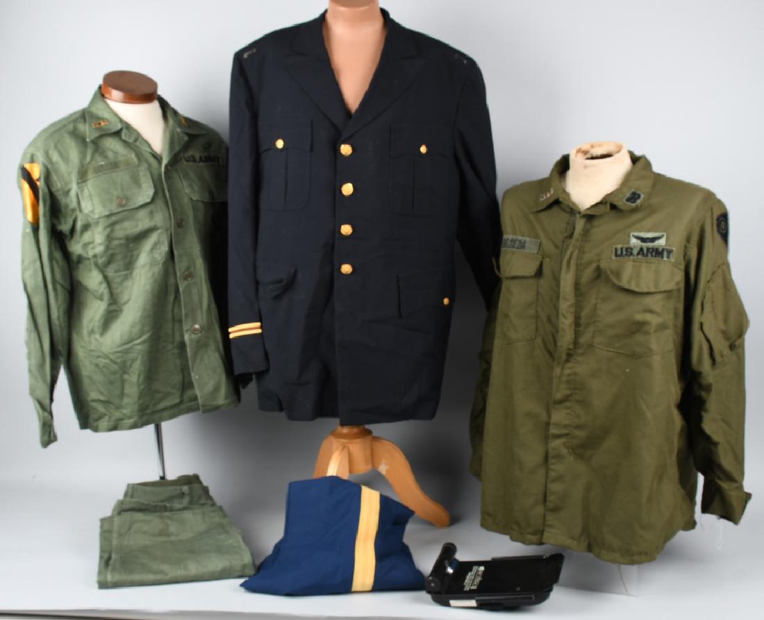 VIETNAM 1ST CAV HELICOPTER PILOT UNIFORM GROUP: Estate acquired grouping of the effects of Joseph Beseda, a 1st Air Cavalry Division helicopter pilot in Vietnam. Chief Warrant Officer Beseda completed two tours in Vietnam; 1969 - 1970 & 1971 - 1972