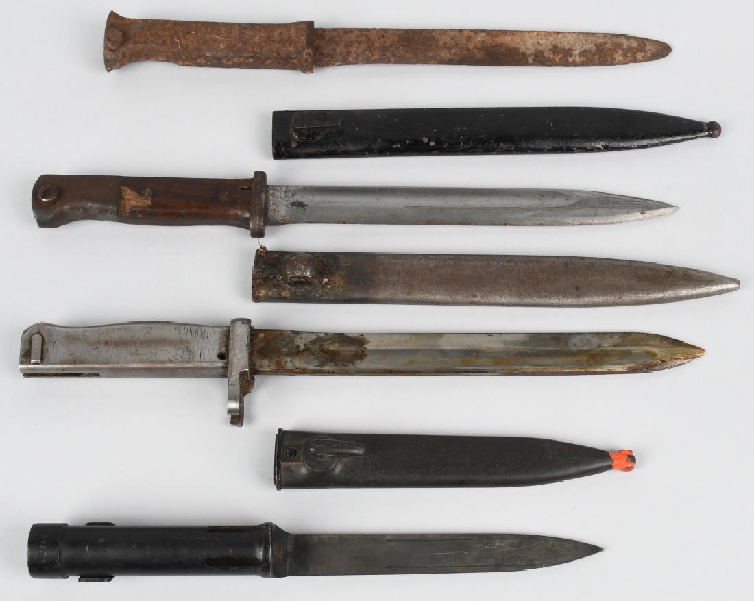 4 MILITARY BAYONETS: 4 Military issue bayonets. One has "EH" inlaid in the grips, possibly Italian. One is a British FN FAL bayonet in excellent condition. One is aluminum. One is in relic condition. Poor - Near Mint.