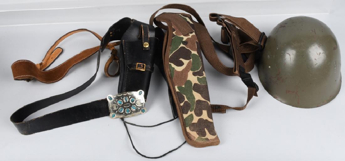SOVIET UNION ARMY HELMET AND HOLSTERS: Lot includes USSR post-WWII Soviet Bloc helmet with leather chinstrap and liner. Also includes two holsters, one made by Uncle Mike's in a nylon camouflage pattern, and a cowboy action black leather h