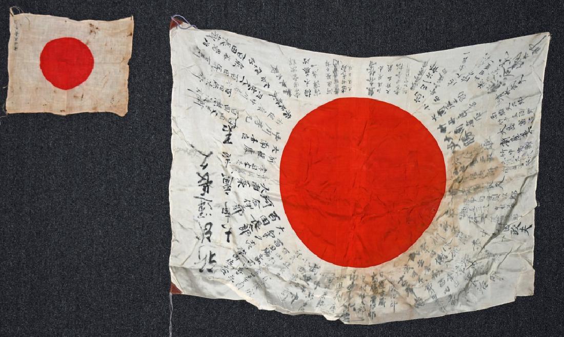 2 WWII JAPANESE FLAGS SILK AND LINEN KANJI STAMPS: Pair of WWII era Japanese flags. Smaller of the two is linen, approximately 12" x 10" and has faint kanji characters. Larger of the two is silk, stamped with reinforced corners, handwritten kanji and 
