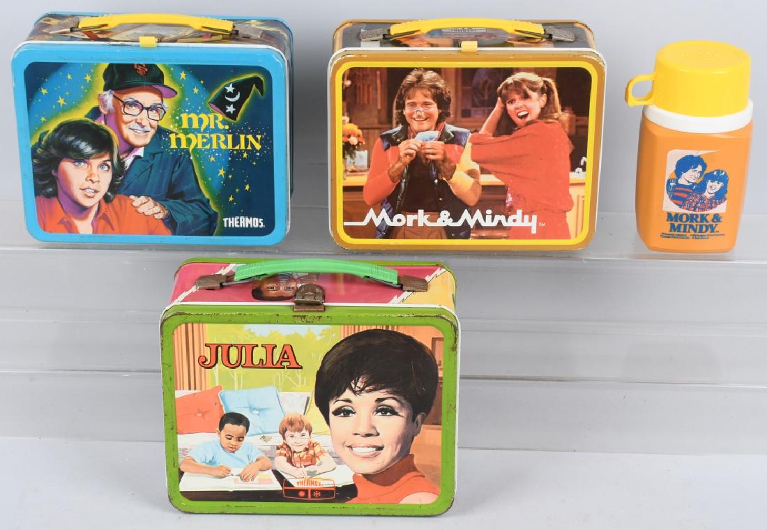 3 VINTAGE LUNCH BOXES JULIA MR. MERLIN MORK: Lot includes 1981 Mr. Merlin, no thermos, 1979 Mork and Mindy with thermos, and 1969 Julia with no thermos. condition varies. Very Good-Excellent