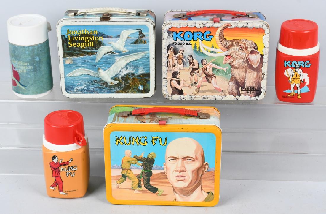 3 VINTAGE LUNCH BOXES KORG KUNG FU and MORE: Lot includes 1973 Jonathan Livingston Seagull with thermos, 1975 Korg with thermos, and 1974 King Fu with thermos. Condition varies. Good-Excellent