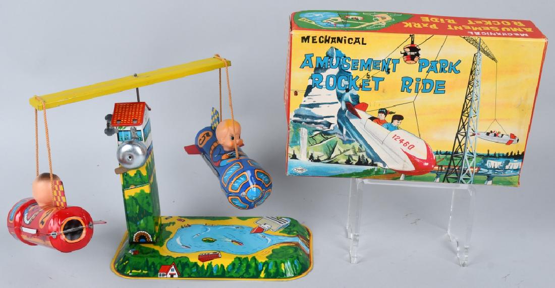 YONE Windup AMUSEMENT PARK ROCKET RIDE w/BOX: All original and complete. Very colorful toy. Looks never played with condition. Windup works. With Box. 9" Excellent