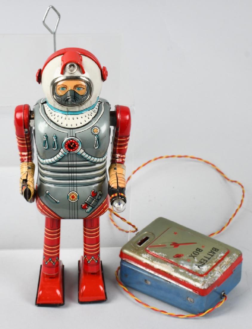 NOMURA Battery Op SPACEMAN ROBOT: Nice all original and complete Spaceman Robot. Still has gun and flashlight. Very nice colors on the robot. Battery box has some loss. Did not work when tested. Great looking Spaceman. 9" Excellent