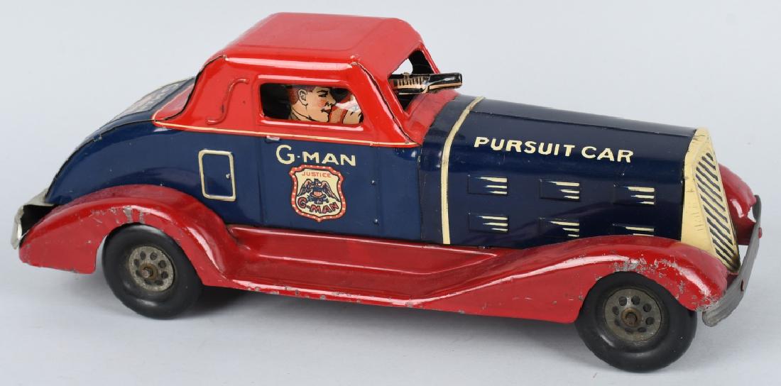 MARX Pressed Steel Windup G-MAN PURSUIT CAR: Very nice original 1930's Marx windup G-Man Pursuit Car. Colors are bright and shiny. Windup works. Light rubs and scratches on fenders. A wonderful example of this toy. 14" Excellent