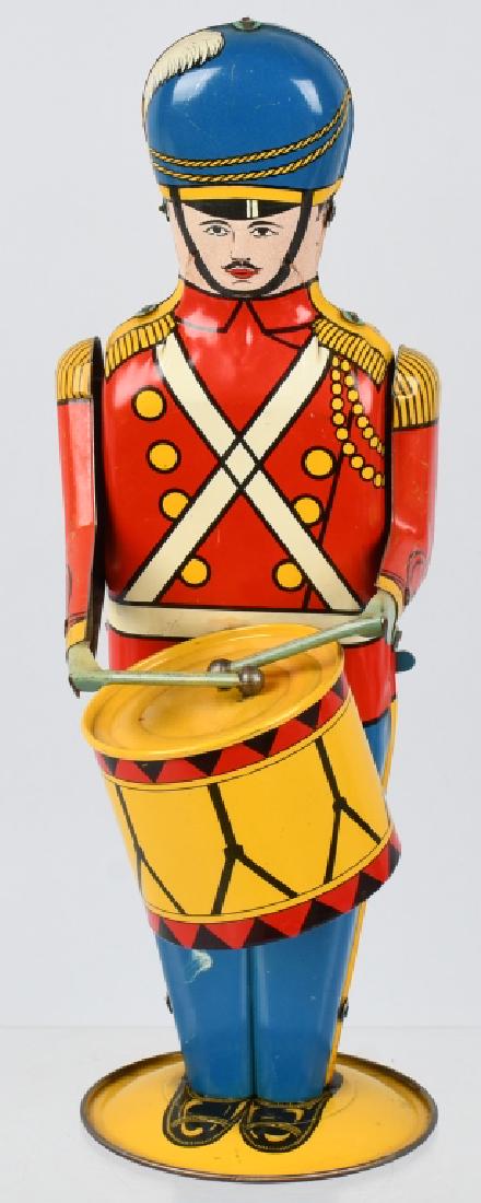 WOLVERINE Tin Windup DRUM MAJOR: All original with great colors. Windup works. 13" Excellent