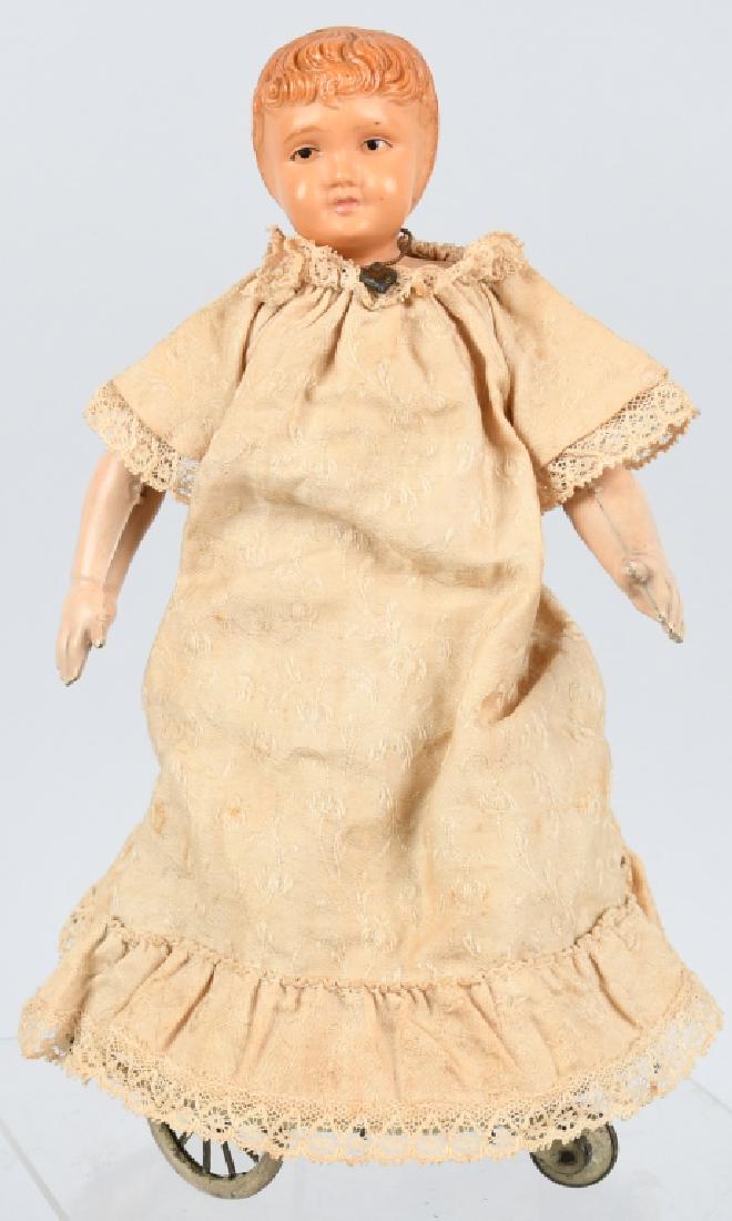 LEHMANN GERMANY tin windup WALTZING DOLL: Very nice all original Lehmann tin windup waltzing doll. Has original dress, celluloid head and heart shaped necklace. Windup works well. 9 1/4", Excellent
