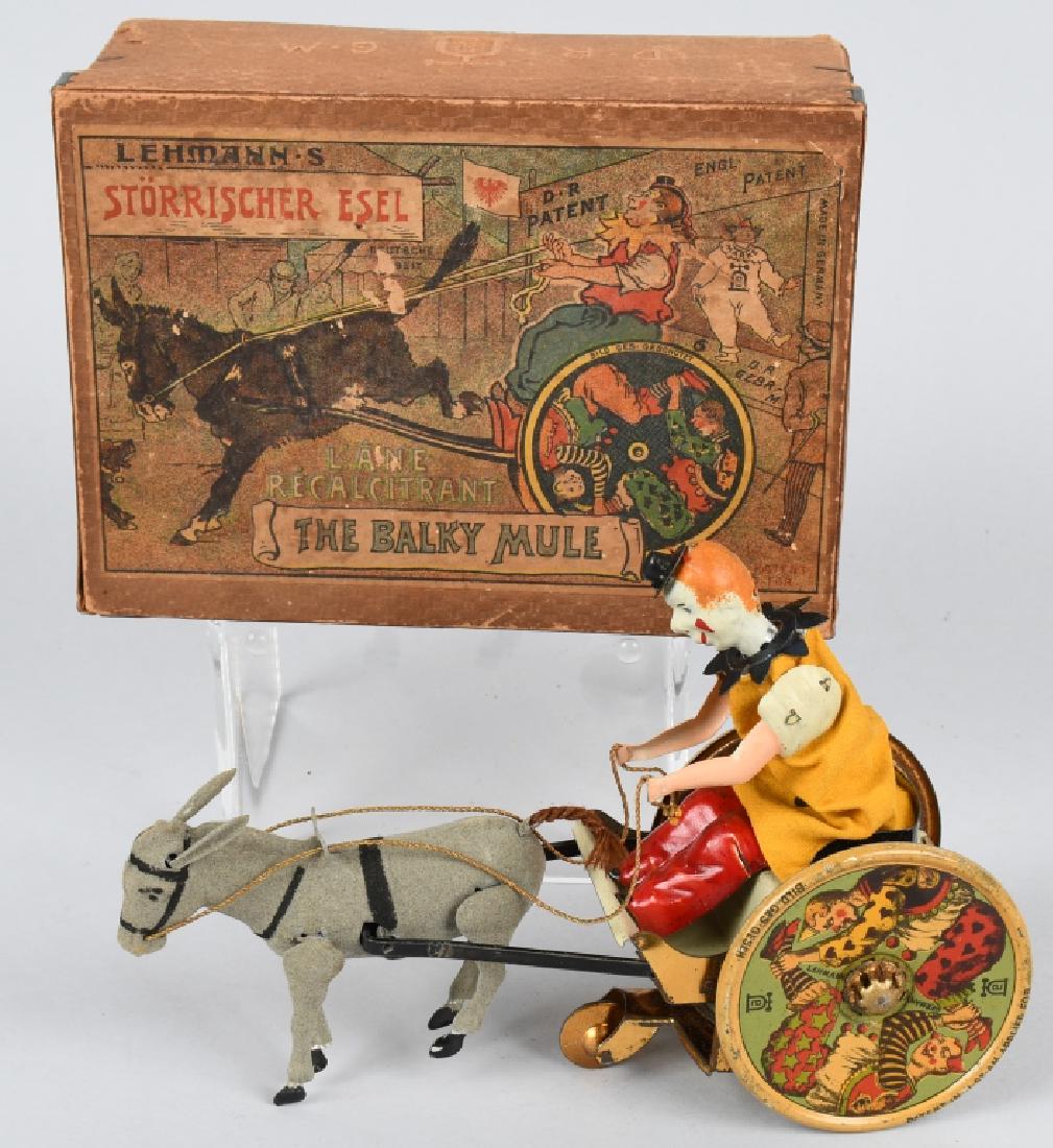 LEHMANN GERMANY tin windup BALKY MULE w/ BOX: All original early version on the Lehmann tin windup Balky Mule. Complete and in working condition. Original box is also complete and original. 7", Bright colors and clothes. Excellent-Near Mint