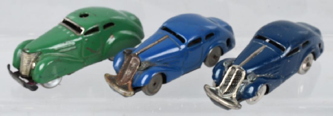 3- SCHUCO TIN WINDUP CARS: Lot of 3 early Schuco Autos. All working. Largest 4 1/2" Excellent