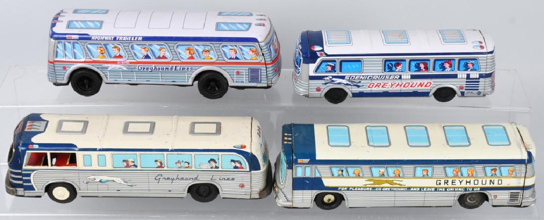 4- JAPAN TIN FRICTION GREYHOUND BUSES: Lot of 4 different tin friction Greyhound Buses. All original. Largest 11" Excellent