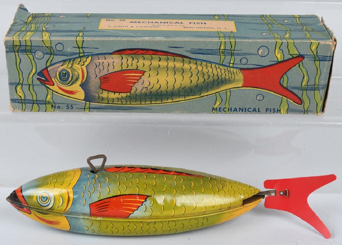 CHEIN tin windup MECHANICAL FISH No. 55 w/ BOX: Tin windup Chein Fish with the original colorful box. the toy is 11" and works, the graphic box has wear and is missing part of one end flap. Excellent