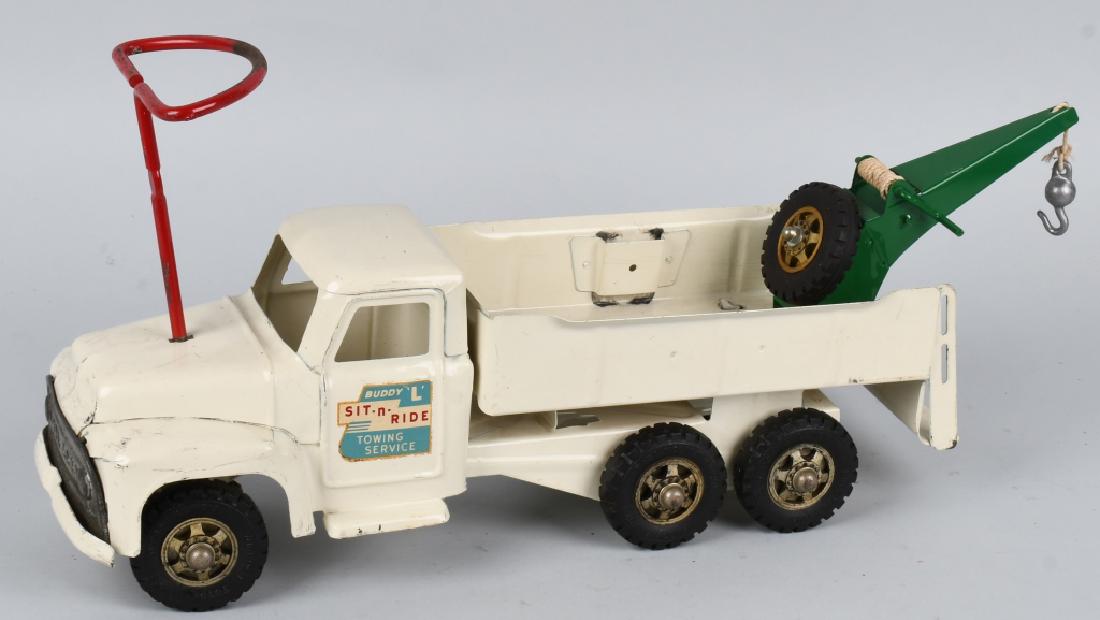 BUDDY L 1950's SIT-N-RIDE TOW TRUCK: Nice all original Buddy l truck. Complete except for seat. Nice paint and decals. 24" Very Good-Excellent