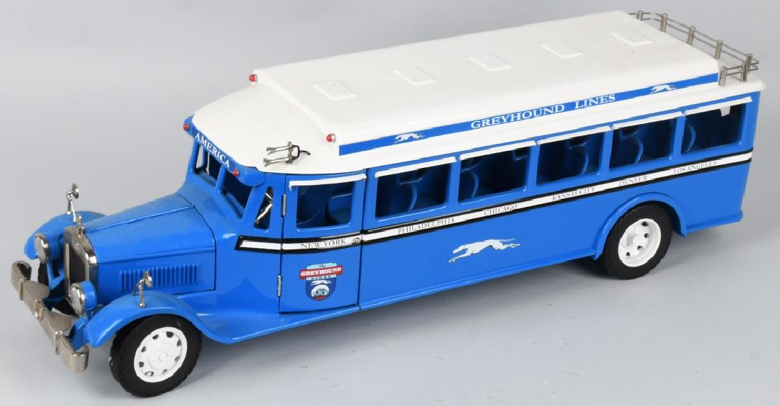 1920's STYLE GREYHOUND MOTORCOACH RETRO 1-2-3: Limited edition pressed steel "Greyhound Motor coach Bus" Retro 1-2-3 LLC, of Chicago numbered 046/275. Made in the style of toys from the 1920's. Very colorful and detailed bus features steer able fr