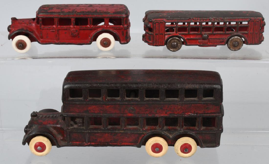 3 A.C. WILLIAMS cast iron BUSES: Lot includes 7 1/2" Double Decker bus. Condition is original with replaced wheels. Also included is a 5" all original Twin Coach and a original paint 5" Fageol bus with replaced tires. Very Good