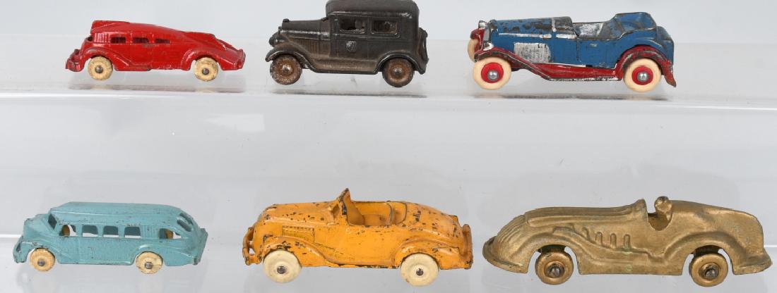 6 VINTAGE cast iron TOYS ARCADE & MORE: Lot includes original Arcade 4 1/2" yellow roadster, 2 Hubley 3 1/2" all original toys, a 5 1/2" repainted Arcade race car,a 4" Kilgore take-a-part roadster with over paint, and a 3" Kilgore sedan wit