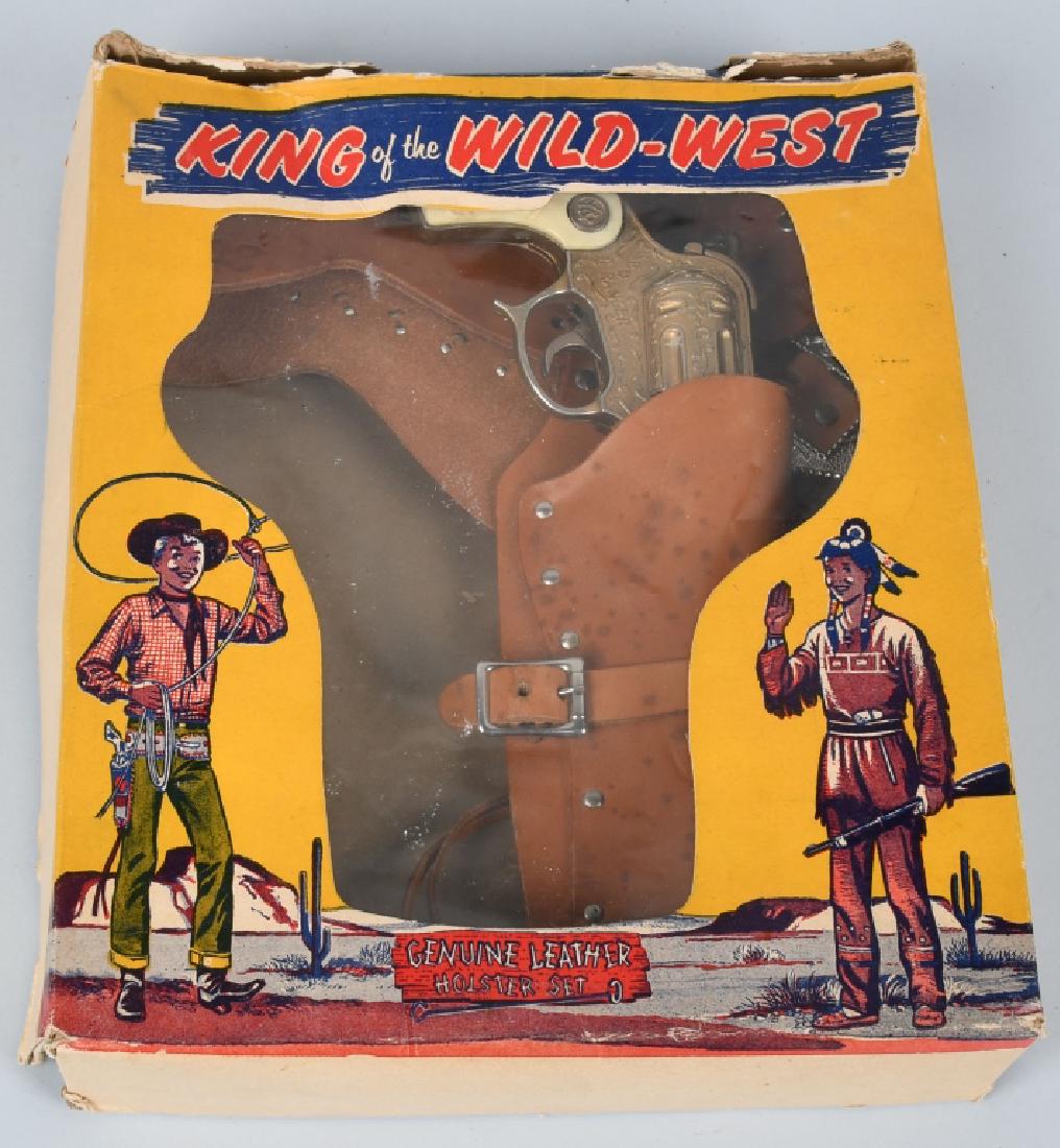 KING OF THE WILD WEST SET: Red Ranger gold finish Cap Gun original and working. With leather Holster. Comes with King of the Wild West Box. 12" Excellent