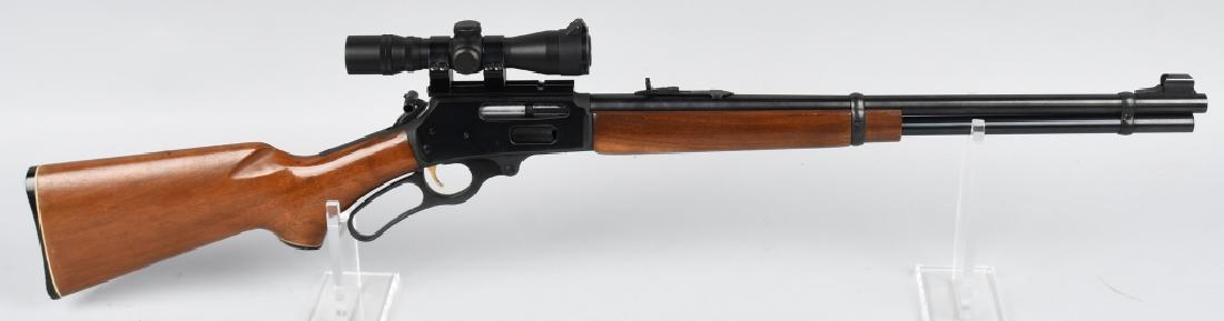 MARLIN MODEL 336 30-30 WIN. LEVER ACTION RIFLE: SN 20050569. 20" Barrel lever action rifle in .30-30 Winchester. Marlin model 336. Features gold-tone trigger, blued finish, wood stock, and fitted with hammer thumbs with extender and Simmons scope.