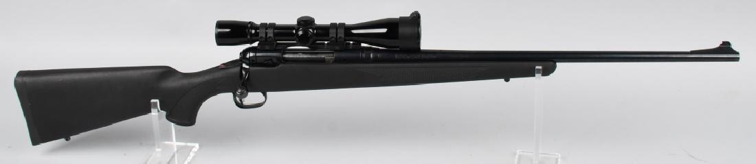 SAVAGE MODEL 11 223 BOLT ACTION RIFLE WITH SCOPE: SN G484039. 23" Barrel bolt action rifle in .223. Savage Model 11. Features black synthetic stock with rubber recoil pad, blade front sight, blued finish. Finish 100%, action crisp, bore near mint. Fi