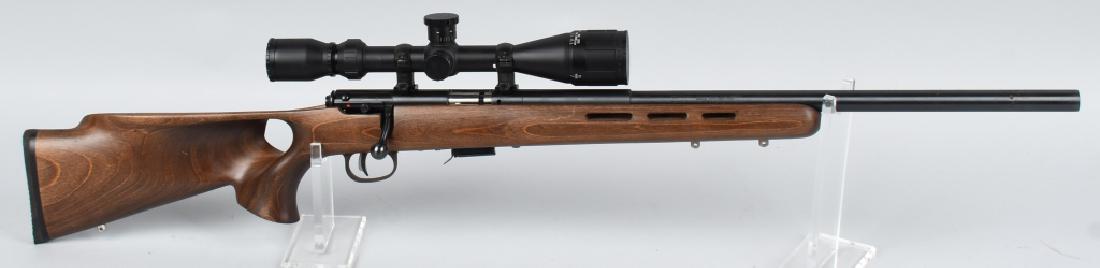SAVAGE MODEL 93R17 17 HMR BOLT ACTION RIFLE SCOPED: SN 0820633. 21" Barrel bolt action rifle in .17 HMR. Savage Model 93R17. Features hardwood thumbhole stock with cheek rest, blued finish, and fitted with BSA "Sweet 17" scope. Includes 1 Magazine. Fin
