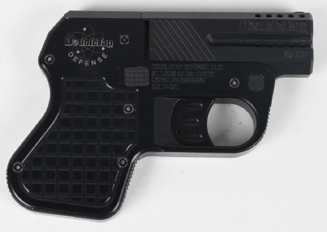 DOUBLETAP DEFENSE 45 OVER UNDER DERRINGER: SN DA23692. 3" barrel tip up over / under 2-shot derringer pistol in .45 ACP. Doubletap Defense Doubletap. Features ambidextrous thumb latch, ported barrels, double action trigger, compartment in grip