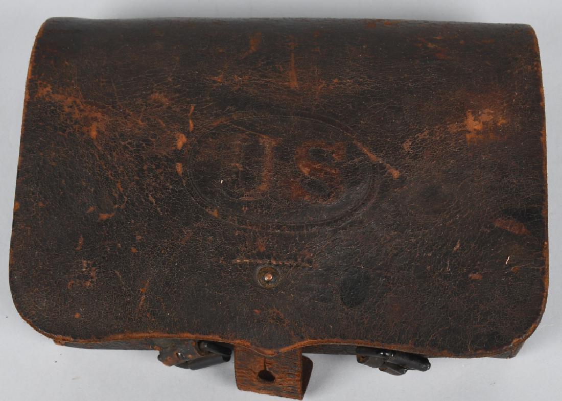 CIVIL WAR MODEL 1864 CARTRIDGE BOX WITH TINS: M1864 cartridge box with embossed "US" box insignia. Box is maker stamped on the inside flap "R. NEOE Philad ", and is inspector stamped, "F. A. {illegible} US Ord Dept Sub Inspector". Both tins are i