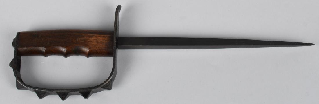 WWI US MODEL 1917 TRENCH KNIFE KNUCLKEDUSTER: LF&C Model 1917 trench knife with triangular blued blade, wooden handle, and "pyramid" style knuckle duster guard. Knife is near mint, with nearly all of its original blued finish intact, and very min
