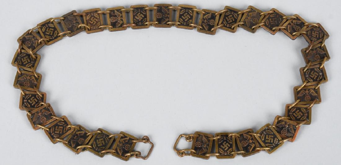 WWII NAZI GERMAN NSDAP GORGET CHAIN COMPLETE: N.S.D.A.P. gorget chain. Bronzed panels of alternating eagle/swastika and a swastika/oak leaves held together with brass wire loops. Panels show on either end is marked "RZM M1/102"