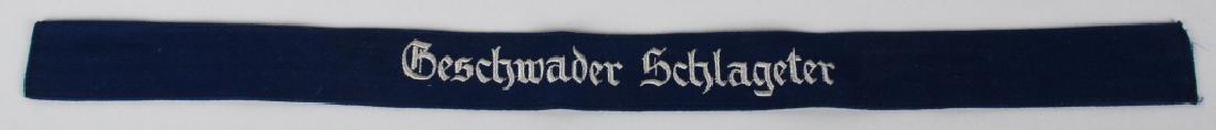 WWII LUFTWAFFE GESCHWADER SCHLAGETER CUFFTITLE: Deep navy blue wool construction Gothic embroidered script in silvery threads approx. 18" (44cm) in length, in extremely fine condition. The I. and II. Gruppe of JG 26 was formed 1 May 1939 in Odendor