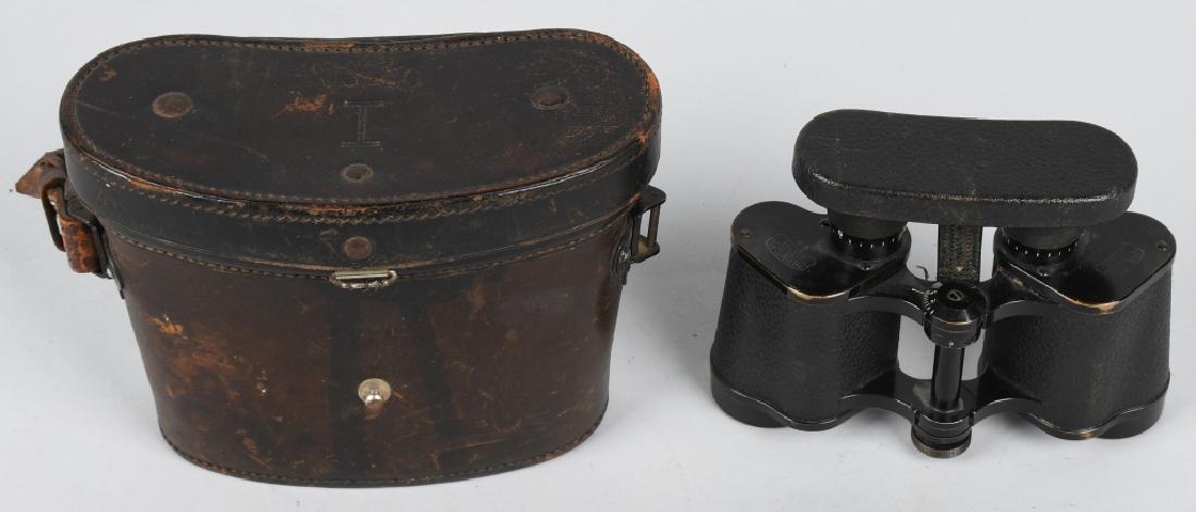 WWII NAZI GERMAN ZEISS 6X MARINEGLAS BINOCULARS: 6 Power binoculars in leather case. Retains original lens cover, marked on the top with serial number, signed by manufacturer Carl Zeiss, Jena and marked "MARINEGLAS." Comes in original leather case m