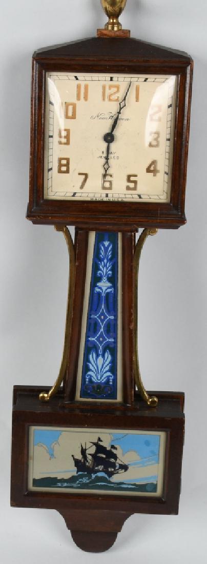 NEW HAVEN BANJO STYLE CLOCK w/ SHIP: Vintage New Haven Banjo Style Clock. 8 Day movement. Nice wood case with gold details, Has image of ship on bottom. Clock works. 18" Excellent