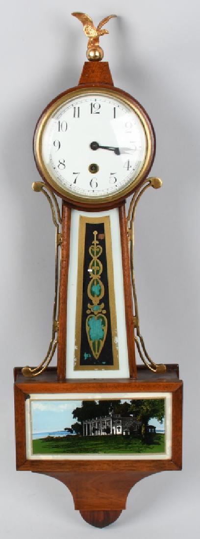 NEW HAVEN BANJO STYLE CLOCK: Vintage New haven Banjo Clock. All original with nice wood case. Has painted glass panels with plantation scene. An American Eagle sits on top of the clock. The face of the clock is porcelain. Clock w