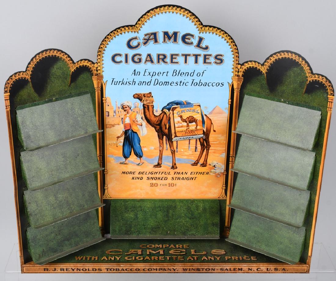 CAMEL CIGARETTE TIN COUNTER DISPLAY: All original Camel tin counter display. Very nice colors. Great image of Arab with Camel. Has shelves that help packages of cigarettes. Used as a counter sales display.