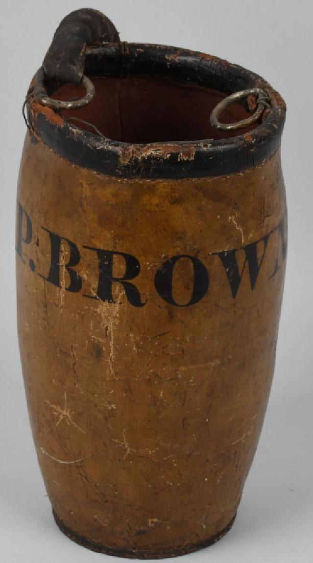 LEATHER FIRE BUCKET Marked P. BROWN: Nice original Leather Fire Bucket. Marked P. Brown. Shows great patina and handle is loose on one side. 16" Very Good