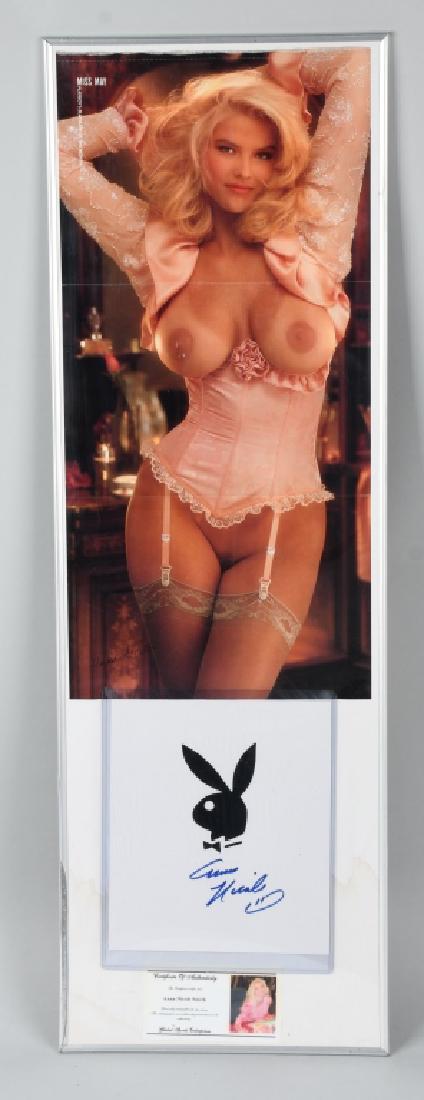 ANNA NICHOL SMITH SIGNED CENTERFOLD w/ COA: Anna Nichol Smith Playboy Centerfold with Autograph. Has been framed for display. Comes with Global Sports COA, 36"x12" Excellent