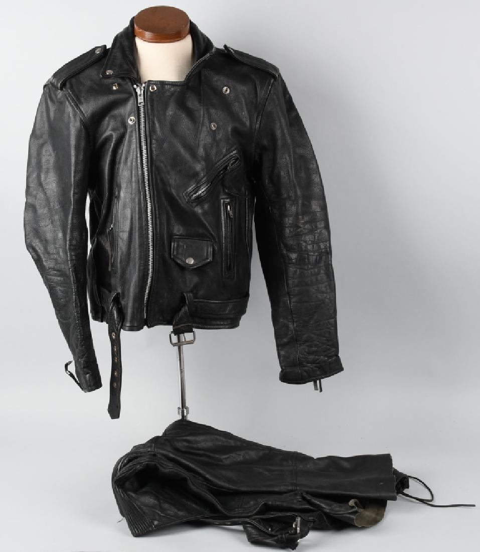 VINTAGE MOTORCYCLE LEATHER COAT & PANTS: Includes great vintage Motorcycle Leather Jacket. Shows perfect patina. Looks to be a size Large. Tags are wore and can't be read. Also includes is a pair of First Classic Leather Riding Pants. Size E