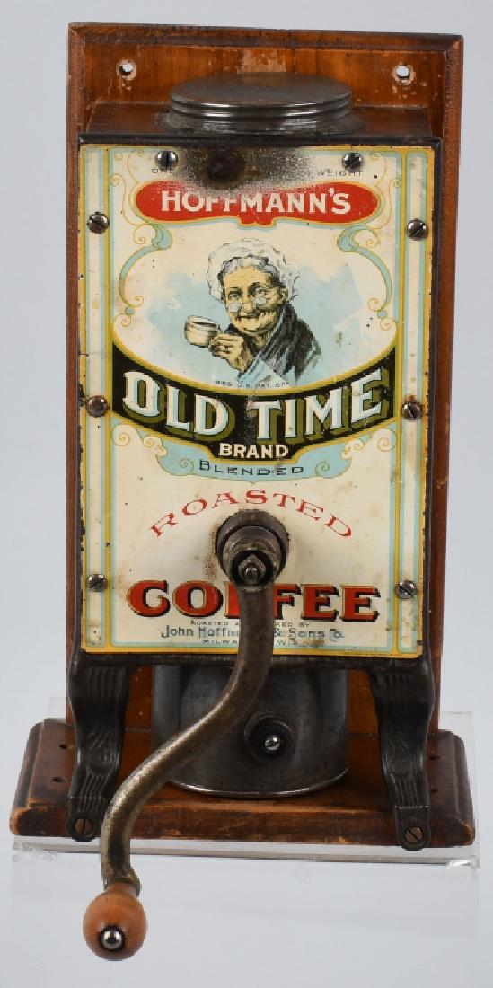 Wood & Iron HOFFMAN'S ADVERTISING COFFEE GRINDER: Early wood and cast iron wall mount Coffee Grinder with Hoffman's Coffee Advertising. All original and complete. Has very nice patina. Rare and unusual piece. 13"x9 1/2" Excellent
